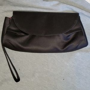 Black Clutch purse. Pink lining.  EUC